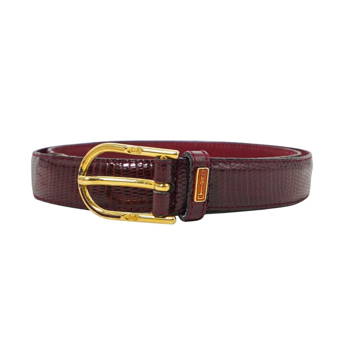 Gucci Italian Burgundy Faux Lizard Belt: Gucci Italian Burgundy Faux Lizard Belt20th c., ItalyGucci faux lizard skin leather belt with a gold metal buckle.L: 40.75" W: 1"