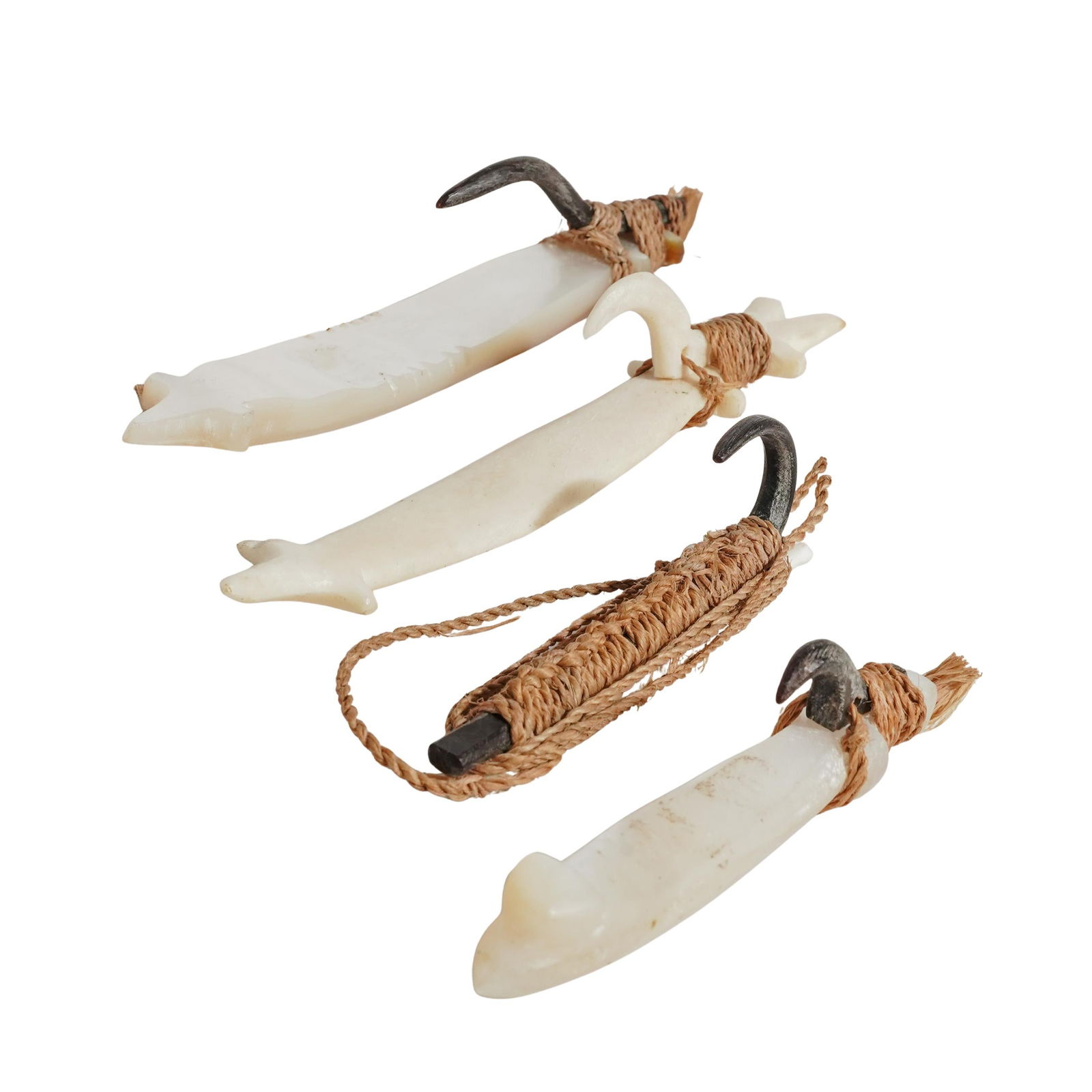 (4 Pc) Antique Pacific Islands Fishing Lures: (4 Pc) Antique Pacific Islands Fishing Lures19th c., Fiji & Solomon IslandsHandmade fishing lures carved from bone, seashell, and mother of pearl with hooks made from bone or turtle shell, and assembl