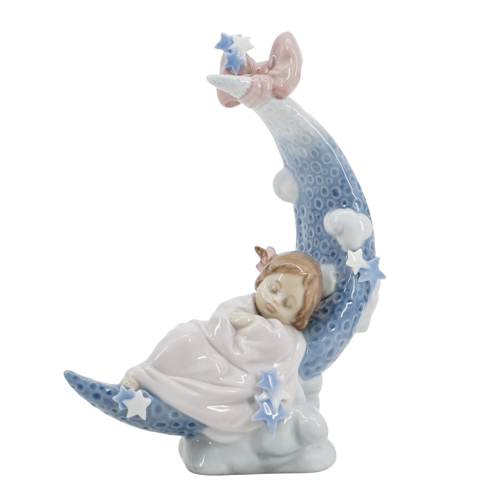Lladro Porcelain "Heavens Lullaby" Figurine: Lladro Porcelain "Heavens Lullaby" Figurine 20th Century, Spain Lladro porcelain figurine, depicting a young girl sleeping on a crescent moon. Titled: "Heavens Lullaby". Model number: #6583. Designer: