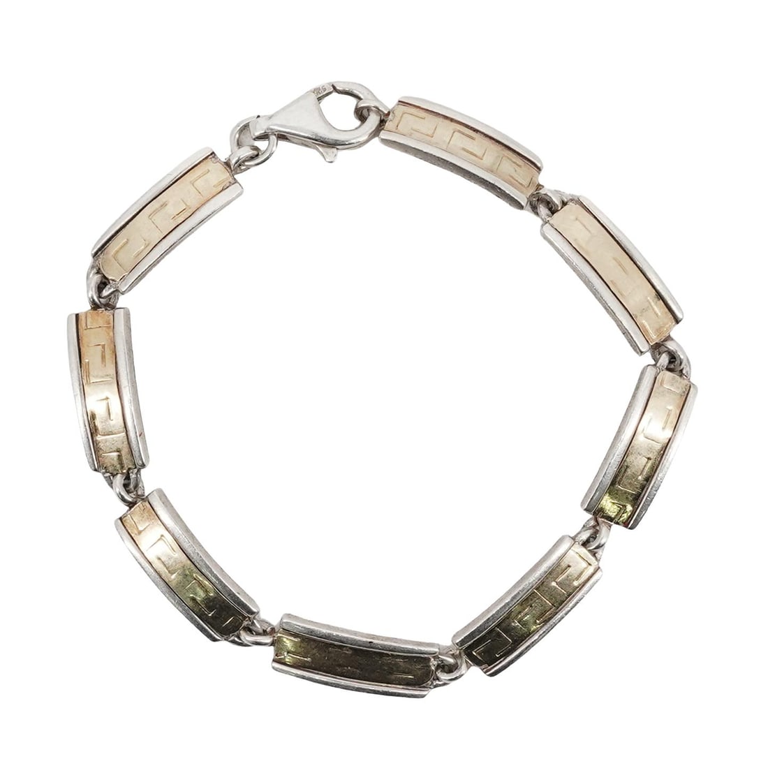 Sterling Silver 925 Link Bracelet: Sterling Silver 925 Link Bracelet 20th Century Sterling Silver 925 Link Bracelet, designed with eight rectangular link pieces, adorned with vermeil motif. Marked 925. Total weight: 10 grs. L: 7". Tota