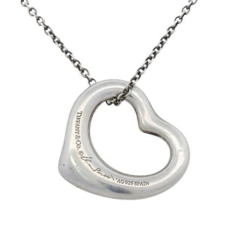 Tiffany & Co. Elsa Peretti Sterling Heart Necklace: Tiffany & Co. Elsa Peretti Sterling Heart Necklace20th Cent., SpainTiffany & Co. collaboration with Elsa Peretti sterling silver necklace, featuring a silver heart pendant. Signed "Tiffany & Co." "Els