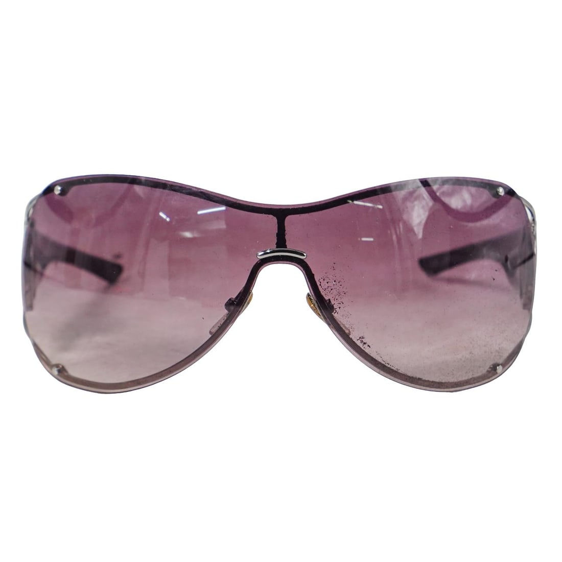 Purple Gucci Sunglasses: Purple Gucci SunglassesItaly, Late 20th-early 21st centuryA pair of dark purple Gucci sunglasses. Marked on arms "made in Italy GG2764/S RFJ94 105" and "Gucci".L (arms) 5 1/2" L (lenses) 5 1/2" W (len
