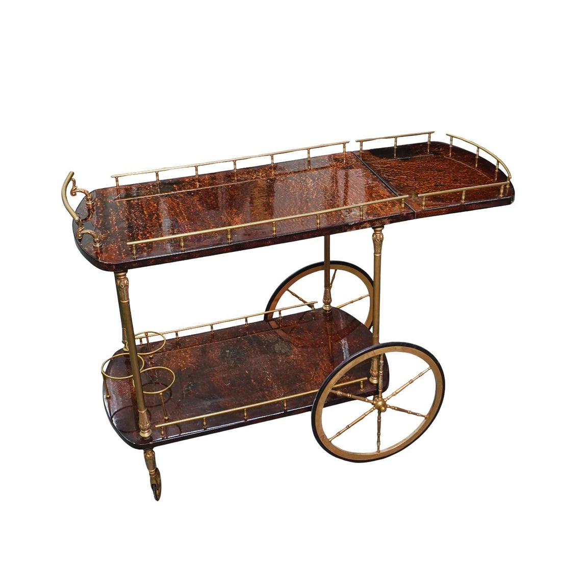 Aldo Tura (1909-1963) Goat Skin Bar Cart: Aldo Tura (1909-1963) Goat Skin Bar Cart1960s, ItalianA lacquered goat skin bar cart with gilt hardware throughout by Aldo Tura (b. 1909 d. 1963, Italian). Marked with handwritten labels on bottom of