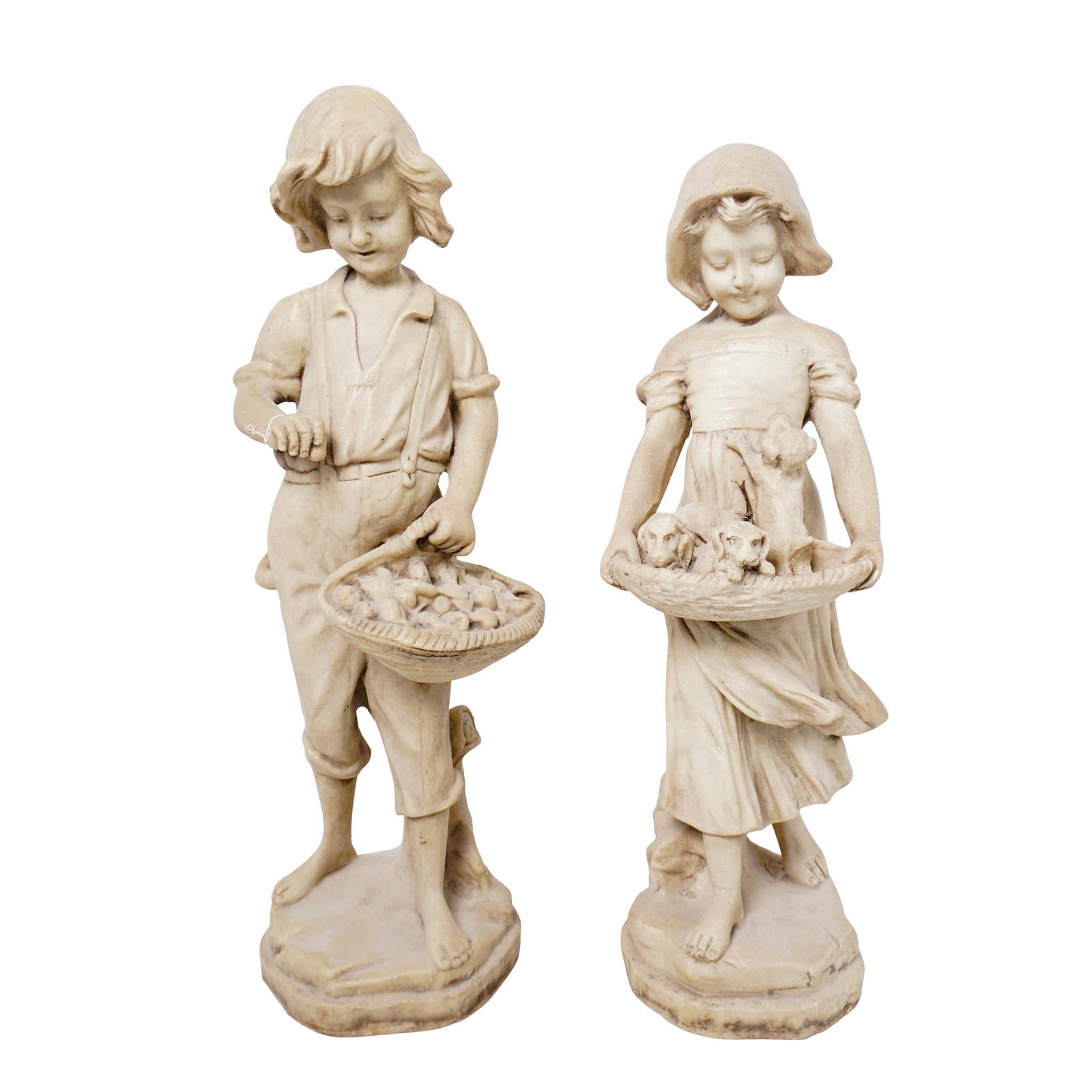Pair of Boy & Girl Garden Stone Sculptures: Pair of Boy & Girl Garden Stone Sculptures 20th century, Continental Pair of garden stone sculptures sculpted into boy and girl figures. The girl holds a basket full of puppies and the boy has a baske