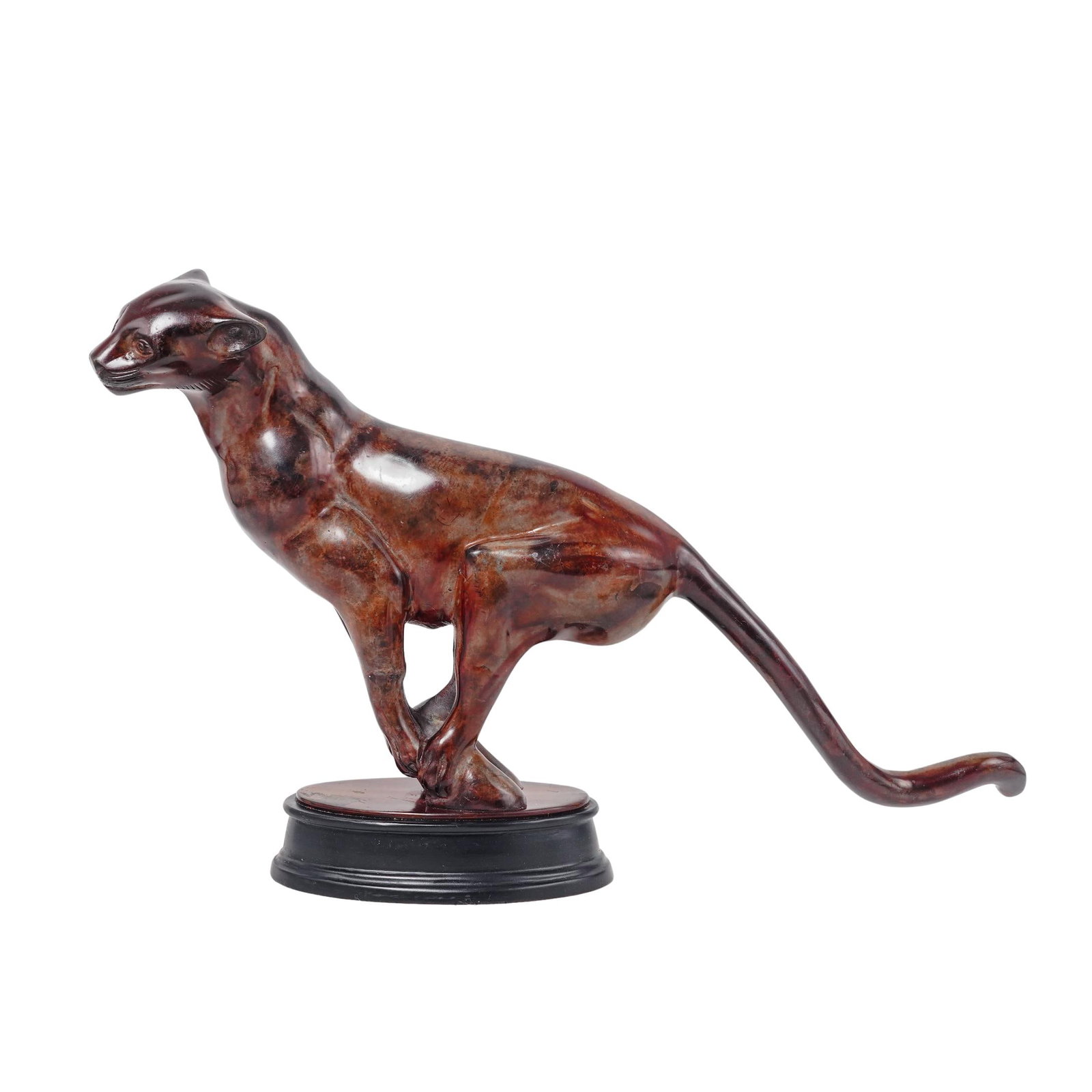 Modernist Patinated Metal Running Panther Sculpture: Modernist Patinated Metal Running Panther Sculpture 20th Century, Continental Modernist patinated metal sculpture depicting a 'Running Panther". On an oval plinth base and with patinated finish. H: 15