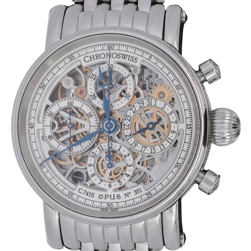 Chronoswiss Opus Stainless Steel Skeleton Automatic Mens Watch: Chronoswiss Opus Stainless Steel Skeleton Automatic Mens Watch1990s, SwissChronoswiss Opus stainless steel automatic mens watch, featuring a skeletonized dial, onion shaped crown, and fluted bezel. Ch