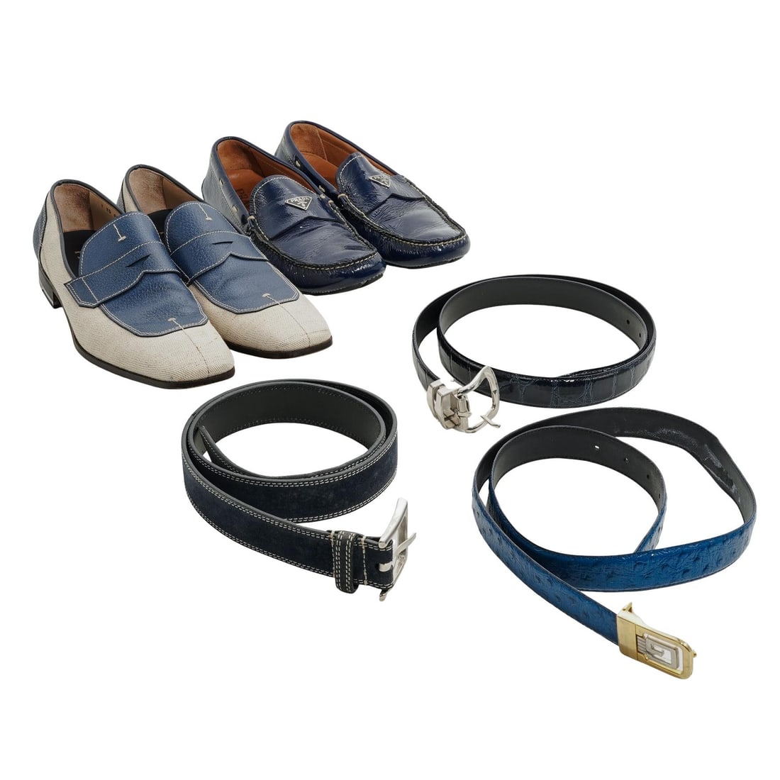 (5 Pc) Designer Prada Men's Loafers Shoes & Belts Grouping: (5 Pc) Designer Prada Men's Loafers Shoes & Belts Grouping20th Century, Varied.(5 Pc) Designer Prada Men's Loafers Shoes & Belts Grouping. Includes:(1 Pc) Vintage Mens Designer Prada loafer shoes. In