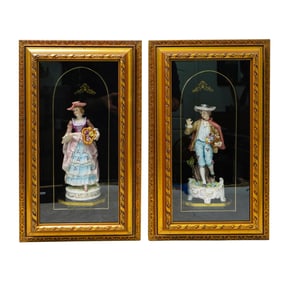 Pair of Framed Porcelain Figurines