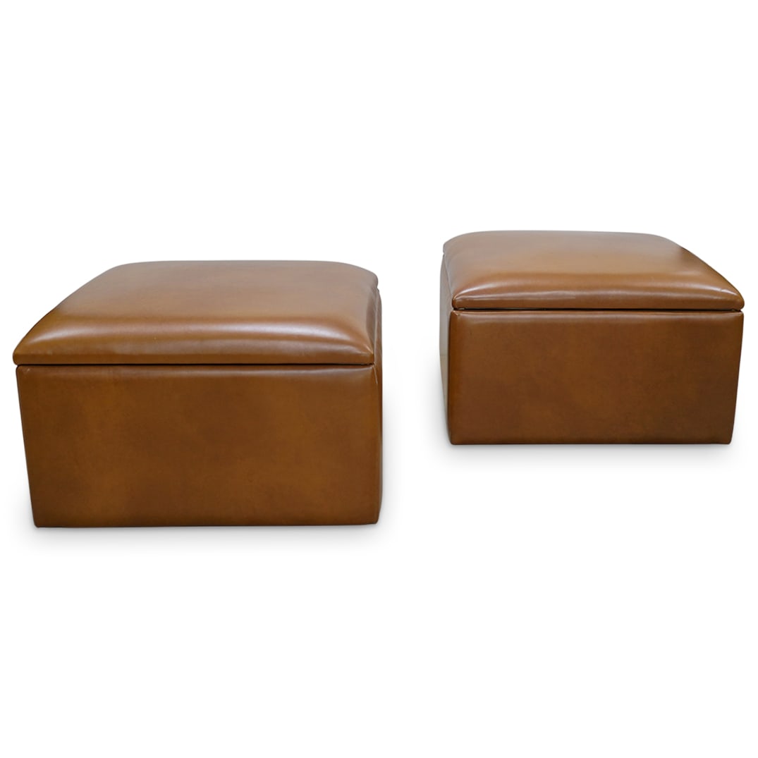 Pair Roche Bobois Style Leather Storage Ottomans: Pair Roche Bobois Style Leather Storage Ottomans21st century, FrenchPair of Roche Bobois style brown leather storage ottomans. Opens by hinge revealing a white lined interior storage.H 16" W 26"