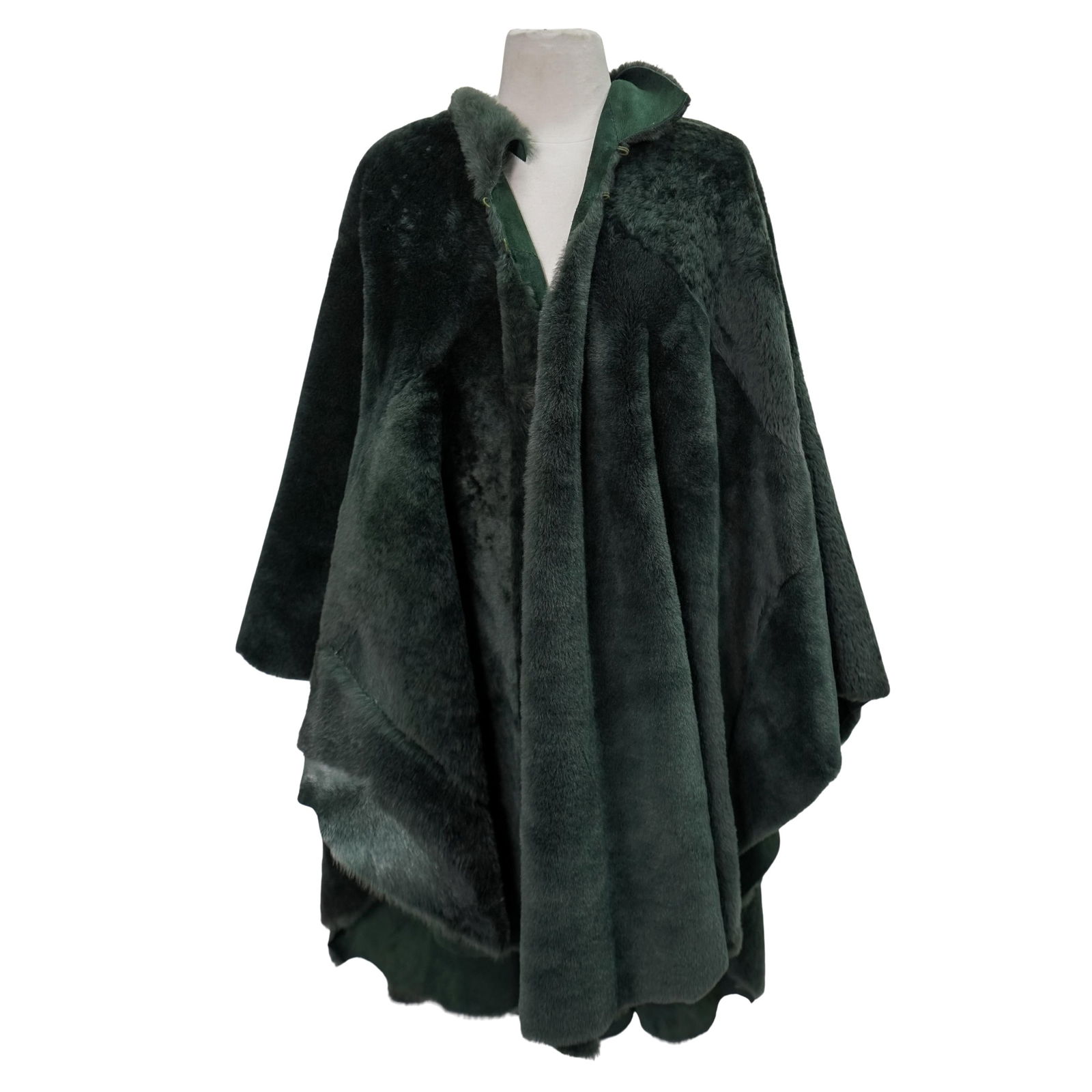 Vintage Designer Prada Fur Ladies Shawl Cape: Vintage Designer Prada Fur Ladies Shawl Cape20th Century. Italy.Vintage Designer Prada fur suede ladies shawl cape in forest green color, with two hidden clasps on the neck.Neck to bottom: 36 1/2". To