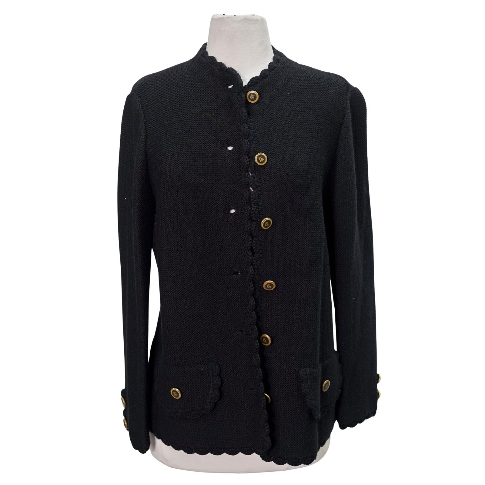 Vintage Pierre Cardin Knitted Wool Black Cardigan: Vintage Pierre Cardin Knitted Wool Black Cardigan1980s. France.Vintage Pierre Cardin knitted wool blend cardigan in black color, with six frontal buttons closure. With Pierre Cardin Paris New York sew