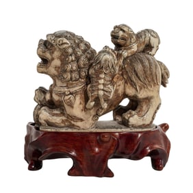 Chinese Carved Bone Foo Dog on Wood Base
