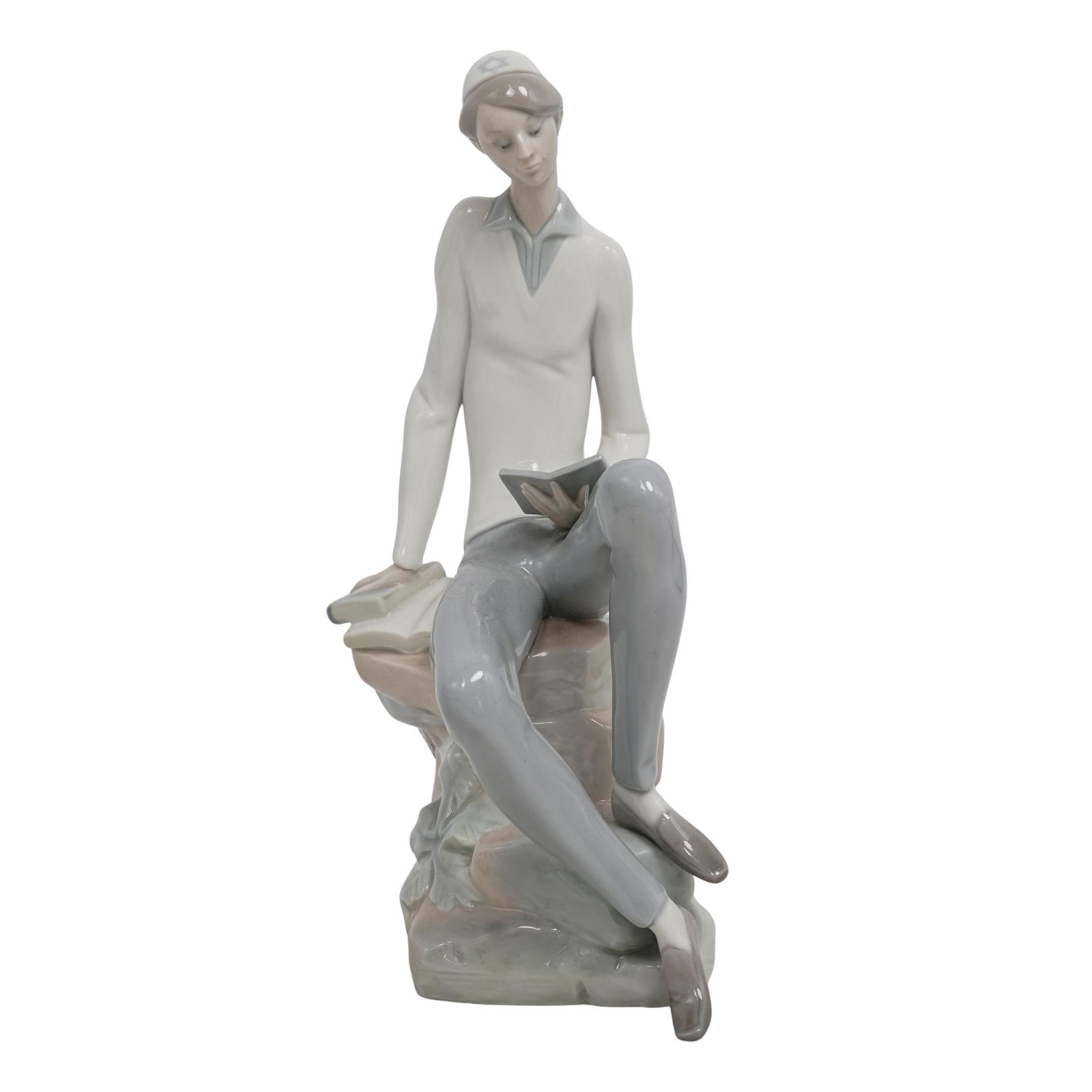 Lladro "Hebrew Student" Judaic Porcelain Figurine: Lladro "Hebrew Student" Judaic Porcelain Figurine1974-2019, SpainA large porcelain Judaic figurine by Lladro titled "Hebrew Student" as part of their Judaic Collection, available 1974-2019 as pattern