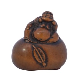 Japanese Boxwood Netsuke of Hotai Seated On Top of Treasure Bag