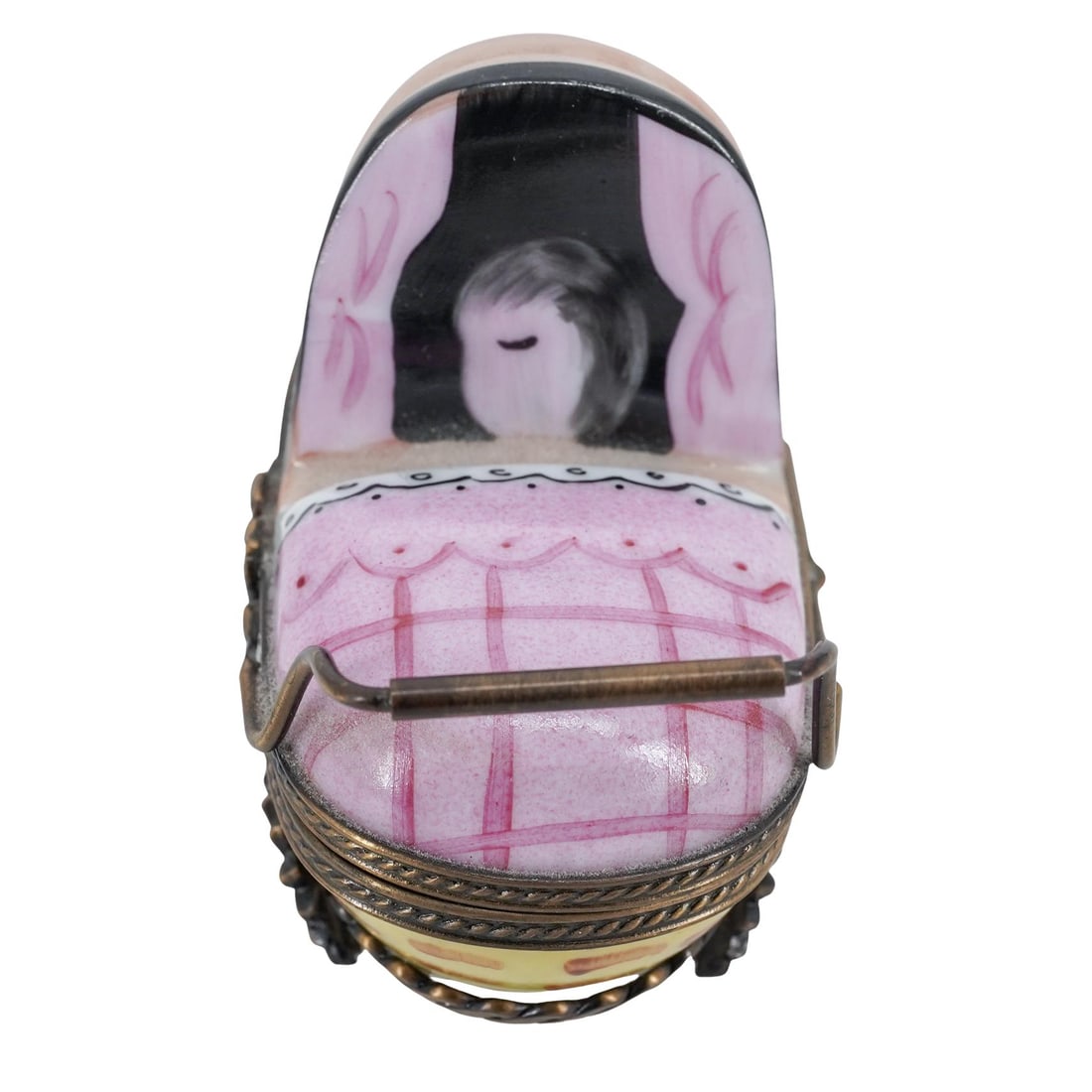 Limoges Porcelain Stroller Trinket Box: Limoges Porcelain Stroller Trinket Box 20th Cent., France Limoges porcelain trinket box, in the form of a baby stroller with hand painted details, brass wheels, closure, and handle. Hand signed "Peint