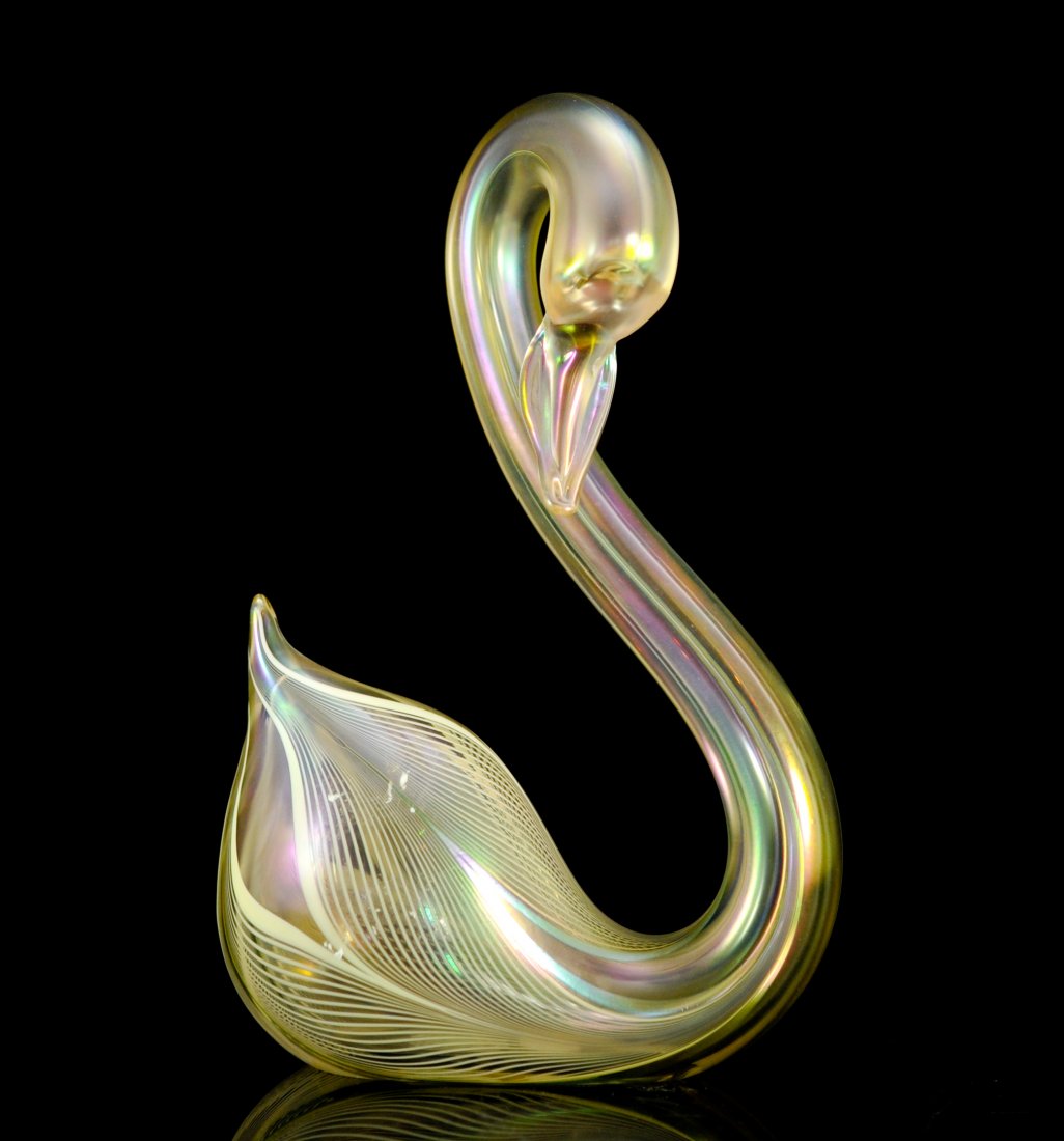 Stuart Abelman large art glass swan. Signed: DESCRIPTION: Stuart Abelman large art glass swan. Elegant full body with an exaggerated design. Hand blown glass with off white and iridescent internal lines from tail to bill. Overall iridescent shee