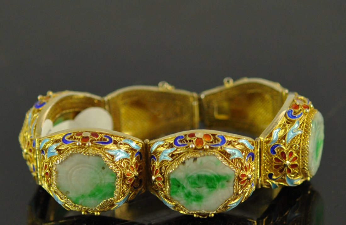 Vintage Chinese silver filigree and jade bracelet: DESCRIPTION: Vintage Chinese silver filigree and jade bracelet. Six link design with four hand carved jade stones. Each jade stone is set in a meticulously hand done silver filigree link. Accented by