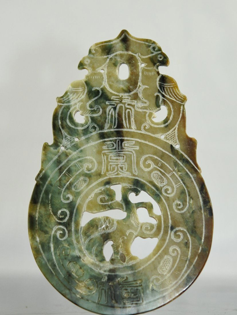 Chinese hand carved and engraved jade plaque: DESCRIPTION: Chinese hand carved and engraved jade plaque. Spinach green jade with hues of white hand carved jade plaque. Engraved nature motif on one side with the reverse engraved with Chinese symbo