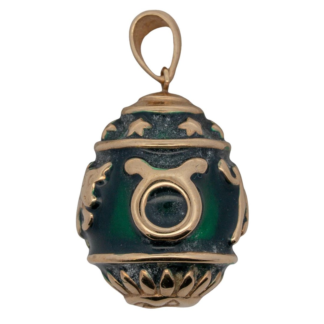 Taurus Bull 14K Gold & Enamel Egg Pendant: Taurus Bull 14K Gold & Enamel Egg Pendant 20th c., Continental 14k gold egg with green enamel featuring taurus bull zodiac symbols and a sun on the bottom. It is hallmarked JTL 14K on the bail. 2.1g (