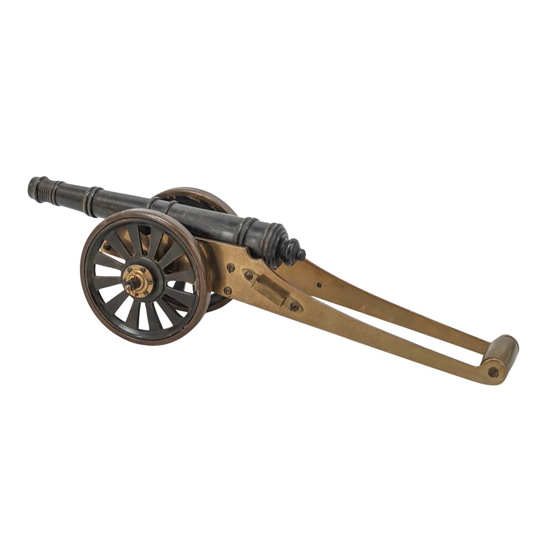 Antique Carved Horn and Brass Cannon: Antique Carved Horn and Brass CannonLate 19th- 20th century, ContinentalAntique carved horn cannon with brass framework. Carved bone wheels with brass accents.H 3 3/8" L 13" W 3"