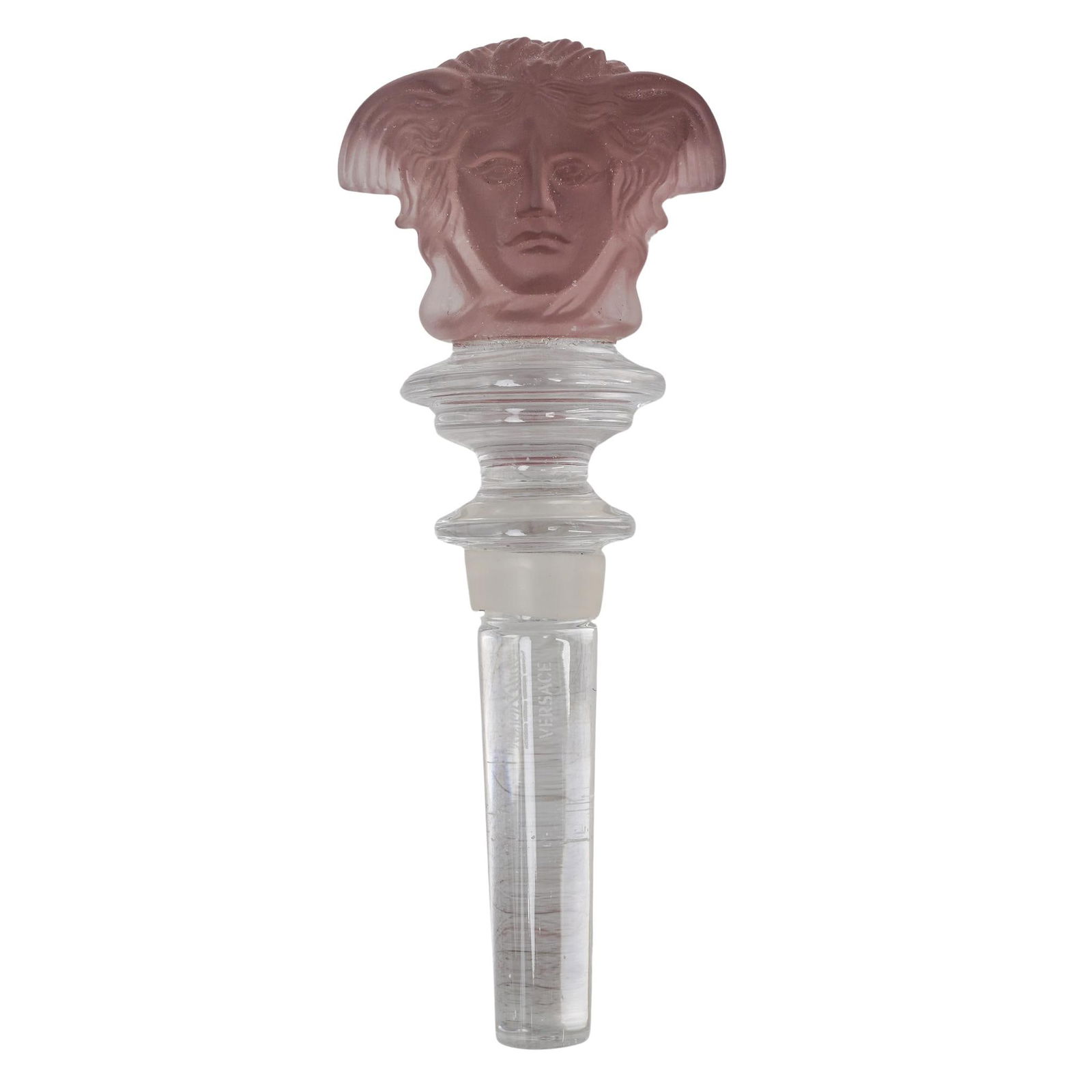 Rosenthal Versace Medusa Crystal Stopper: Rosenthal Versace Medusa Crystal Stopper20th Century, Germany.A Rosenthal Versace crystal stopper featuring a translucent purple colored head of Medusa along the top and clear crystal along the stem.