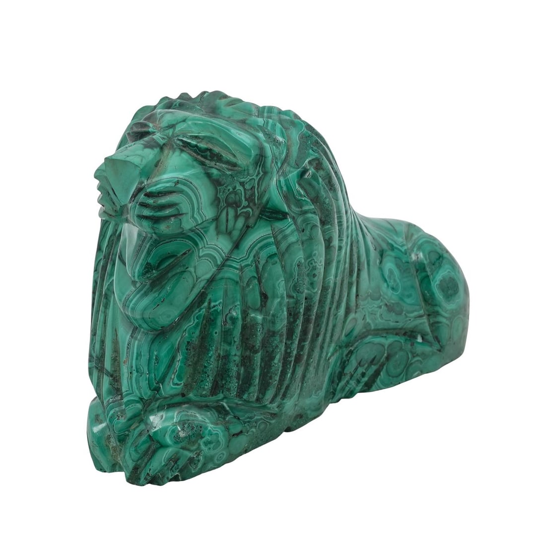 Carved Malachite Lion Sculpture: Carved Malachite Lion Sculpture20th Century.Carved malachite lion sculpture, carved from genuine malachite, with vibrant green hues and characteristic patterns.H: 4 1/2" W: 8"