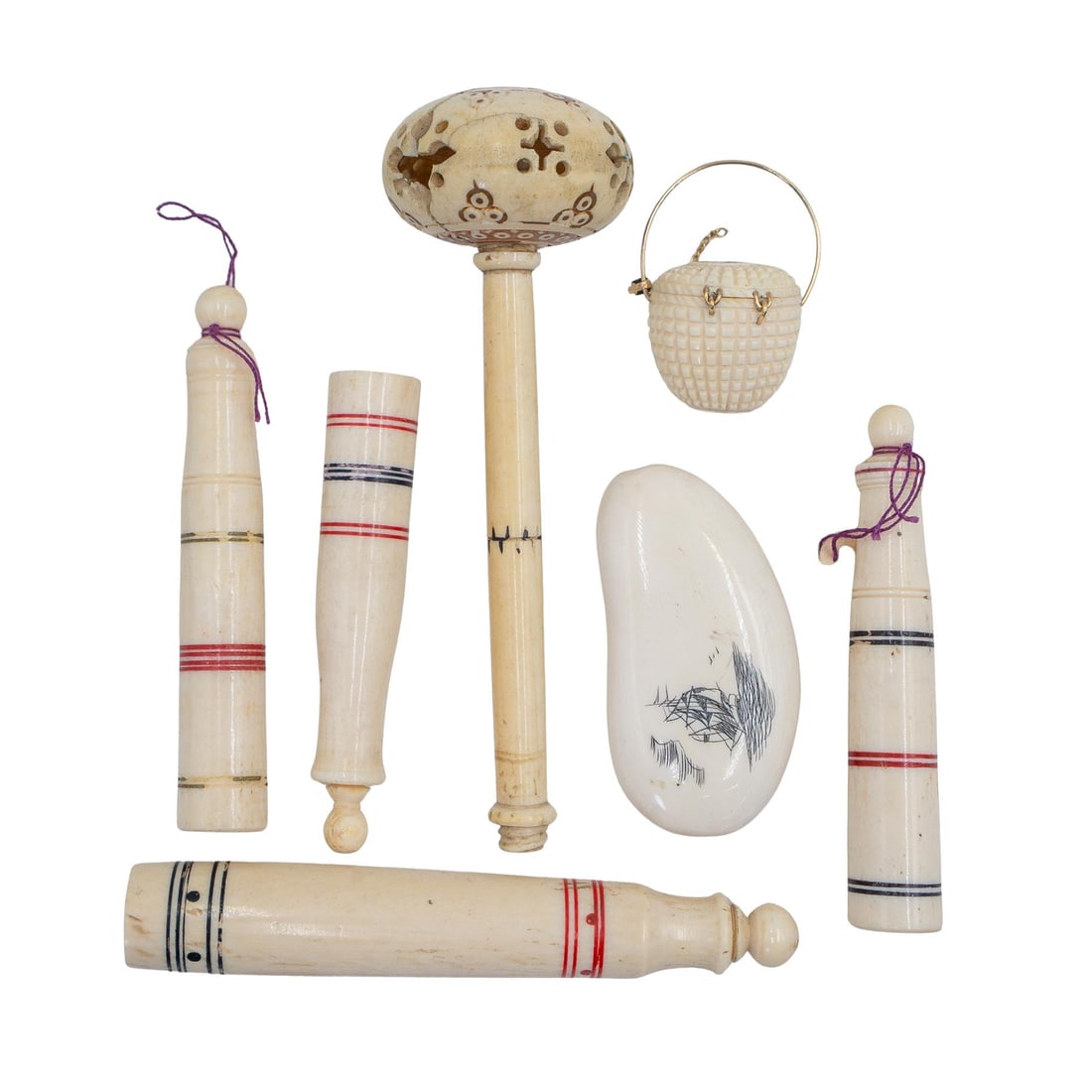 (7 pcs) Antique Scrimshaw and Bone Grouping: (7 pcs) Antique Scrimshaw and Bone GroupingLate 19th-early 20th century, ContinentalA seven piece grouping of antique scrimshaw and carved bone items.x1 Small scrimshaw nautical pendant.x1 Carved bone