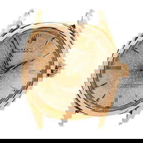 Vintage Rolex Oyster Perpetual 18k Gold Watch: Vintage Rolex Oyster Perpetual 18k Gold WatchMid 20th c., SwissVintage automatic 18k gold watch with a gold face featuring baton markers and stick hands. The inside of the case is marked Montres Rolex
