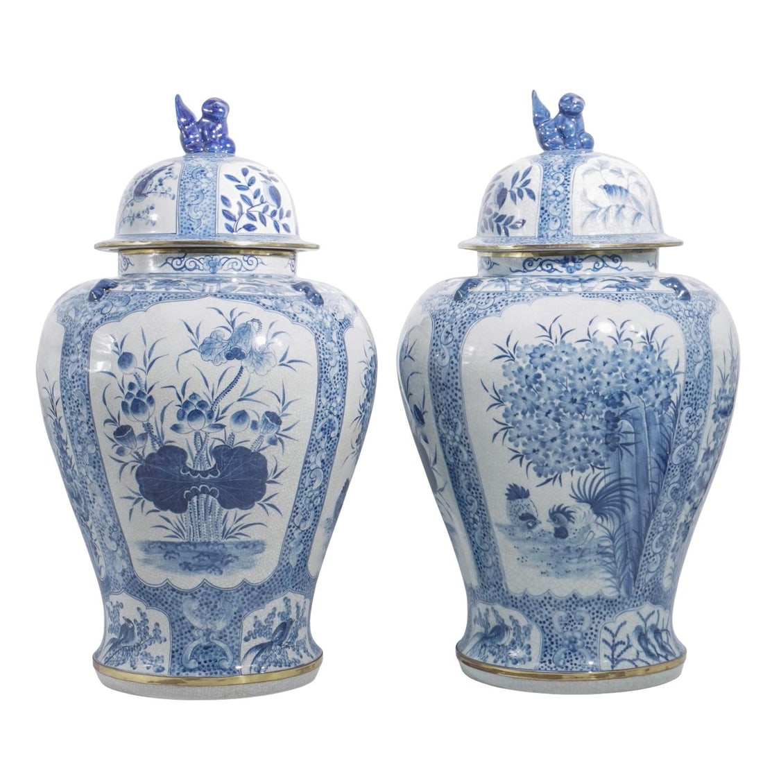 Pair of Maitland Smith Blue and White Porcelain Urns: Pair of Maitland Smith Blue and White Porcelain Urns20th century, ThailandA pair of handcrafted blue and white crackle porcelain urns with foliage and avian motifs throughout by Maitland-Smith (establ