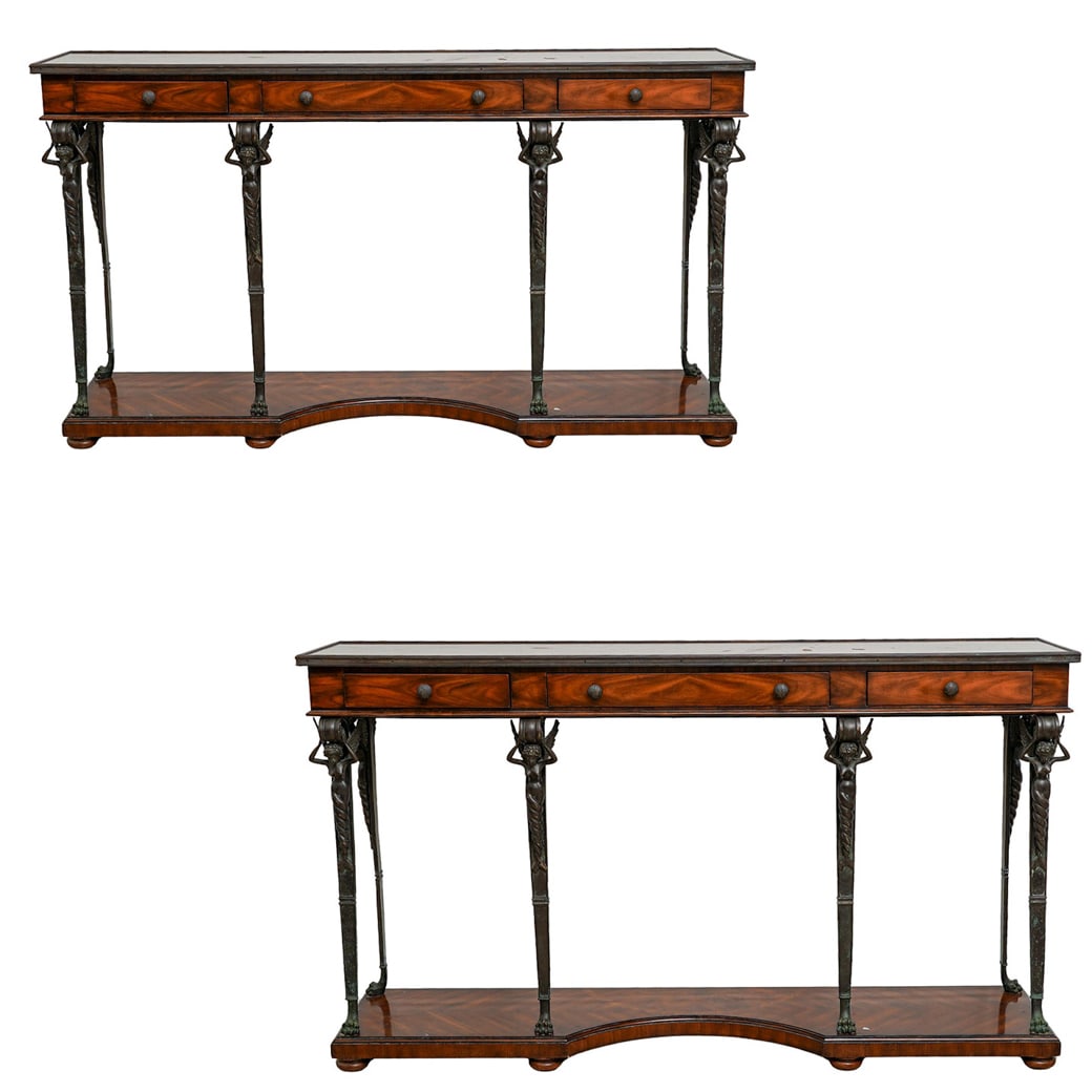 Pair of Theodore Alexander Console Tables: Pair of Theodore Alexander Console Tables20th Cent, ContinentalPair of Theodore Alexander console tables crafted by Veneer wood, Figural iron mounts of winged figures, Affixed makers plaque interior o