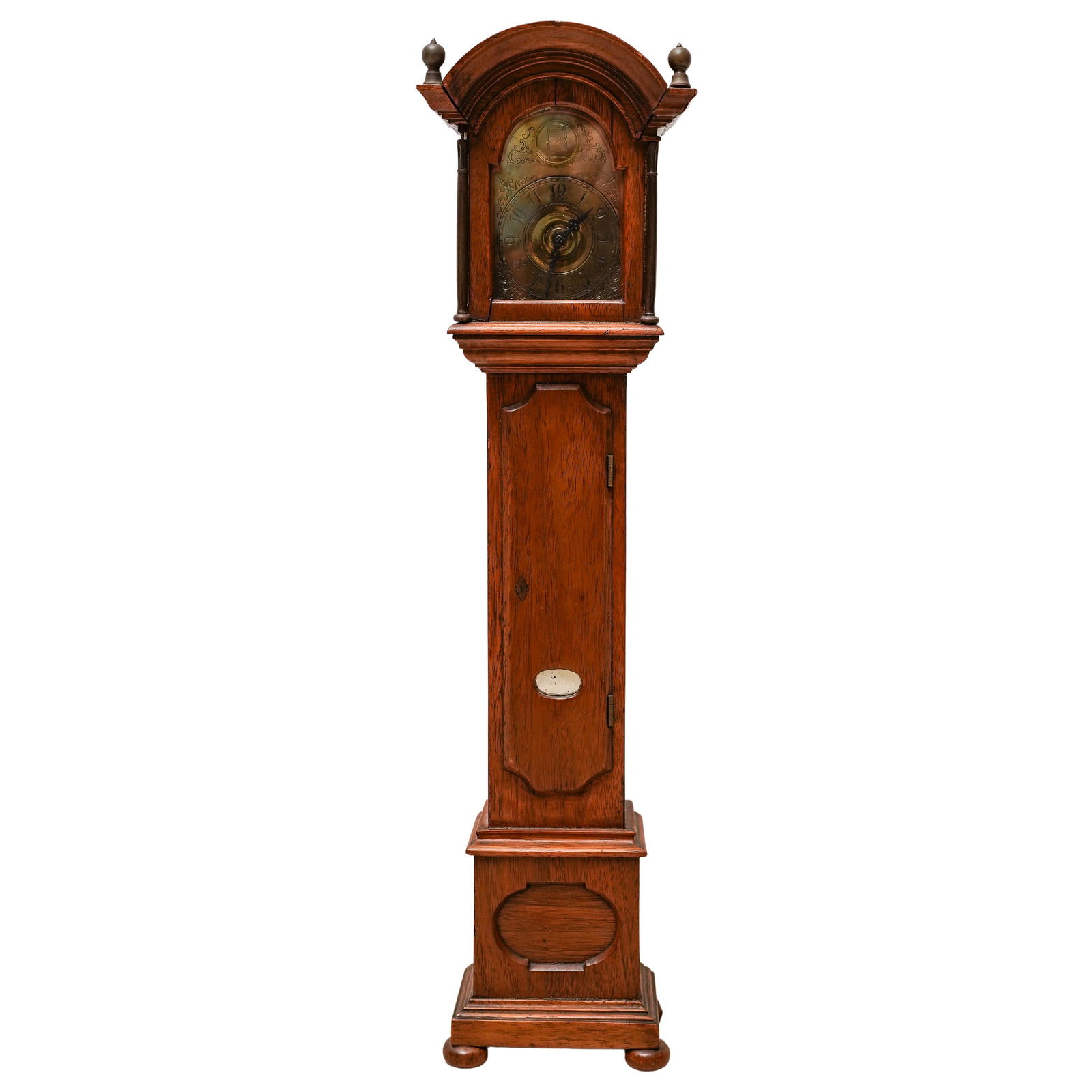 Antique Miniature Grandfather Clock: Antique Miniature Grandfather ClockMid 20th Cent. SwissAntique miniature Grandfather clock with long case, Clock engraved Arabic numbering, and double dial markings hands. An hour glass marks the cres