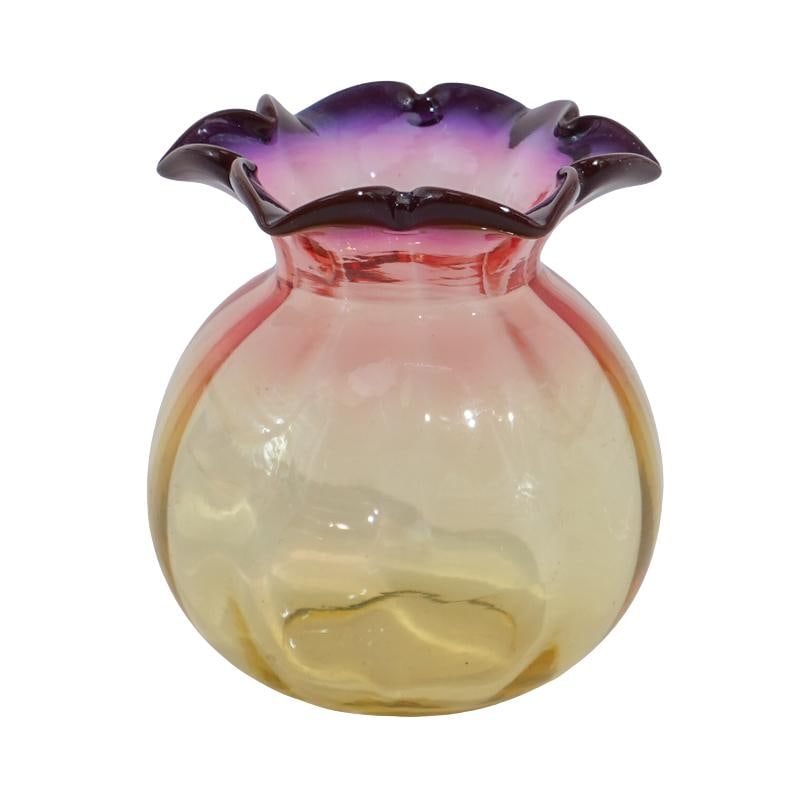 19th C. Thomas Webb & Sons Alexandrite Glass Posy Vase: 19th C. Thomas Webb & Sons Alexandrite Glass Posy VaseLate 19th c., EnglandAntique Alexandrite glass vase with a bulbous citron-colored body and crimped flower petal rim that graduates to a deep purpl