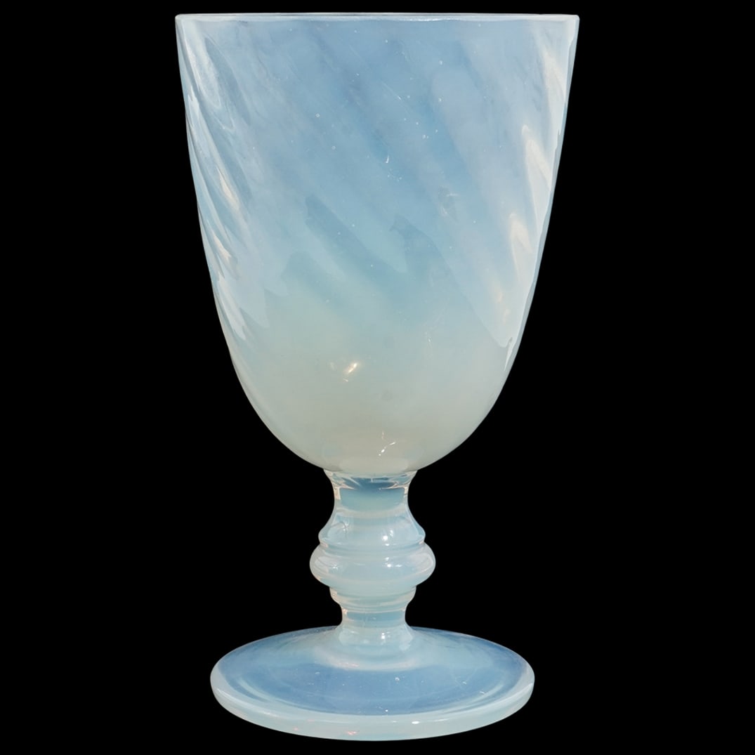 Steuben Glass Translucent Alabaster Swirl Goblet: Steuben Glass Translucent Alabaster Swirl Goblet20th century, USASteuben glass translucent alabaster goblet with swirled ribs.Reference:Shape: 6869Form: GobletPrimary color: AlabasterType: Transluscen