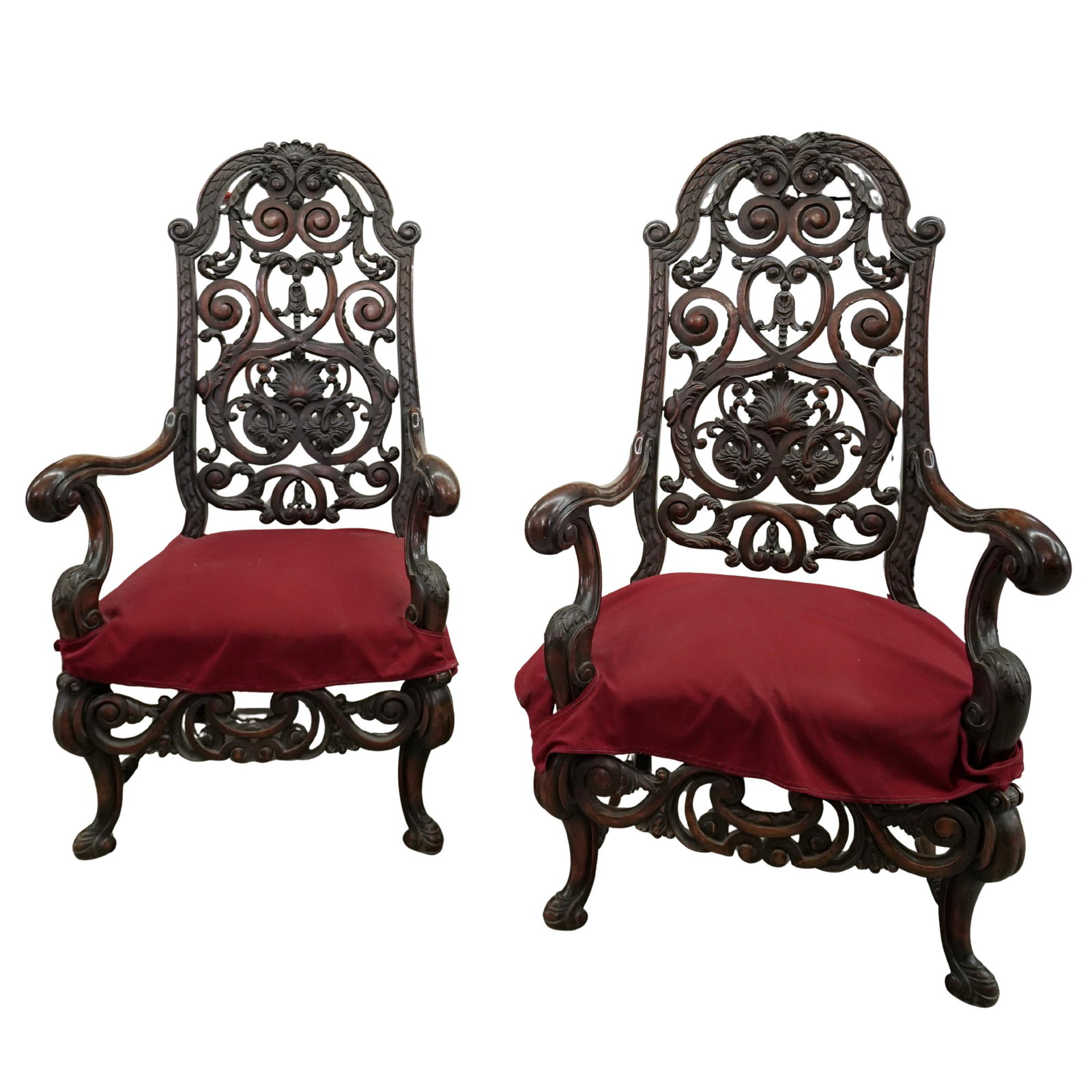 Pair of Italian Renaissance Revival Carved Fine Wood Chairs: Pair of Italian Renaissance Revival Carved Fine Wood Chairs Italian, 20th century A pair of Italian Renaissance Revival fine hardwood chairs with intricate open work carved design on legs and chair ba
