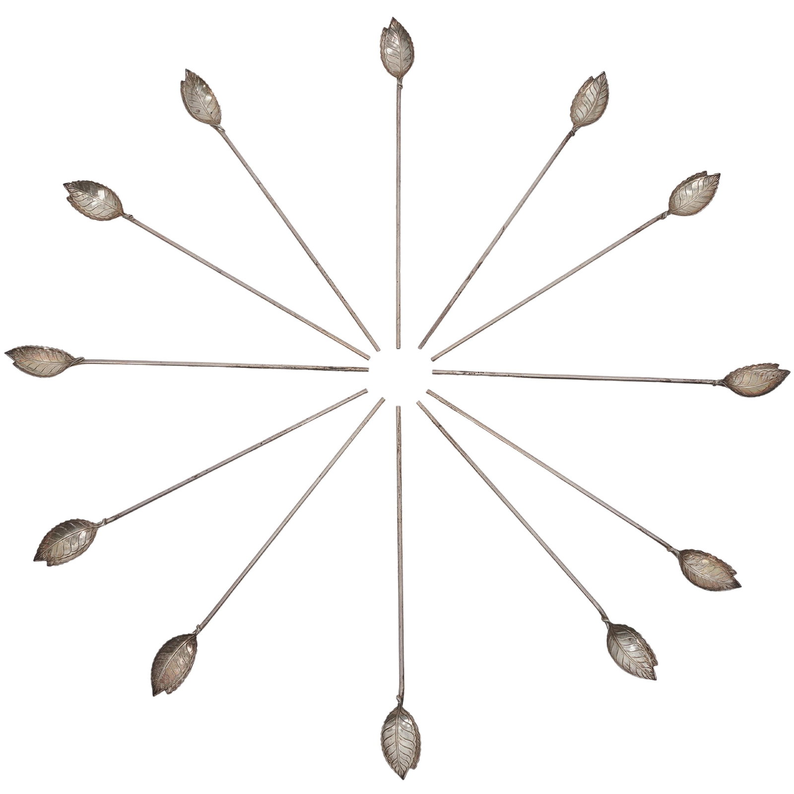 (12 pcs) Tiffany and Co Leaf Cocktail Stirrers: (12 pcs) Tiffany and Co Leaf Cocktail Stirrers 20th century, American A set of twelve Tiffany and Co. cocktail stirrers with hollow stems and leaf-carved bowls. Each marked "Tiffany and Co. sterling" 