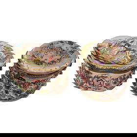 (2 Pc) Antique Capodimonte Porcelain Boxes: (2 Pc) Antique Capodimonte Porcelain Boxes19th Cent., France/ItalyCapodimonte in collaboration with Ferdinand Bing & Co. round porcelain box decorated with a raised cherub scene and a gilt and grape v