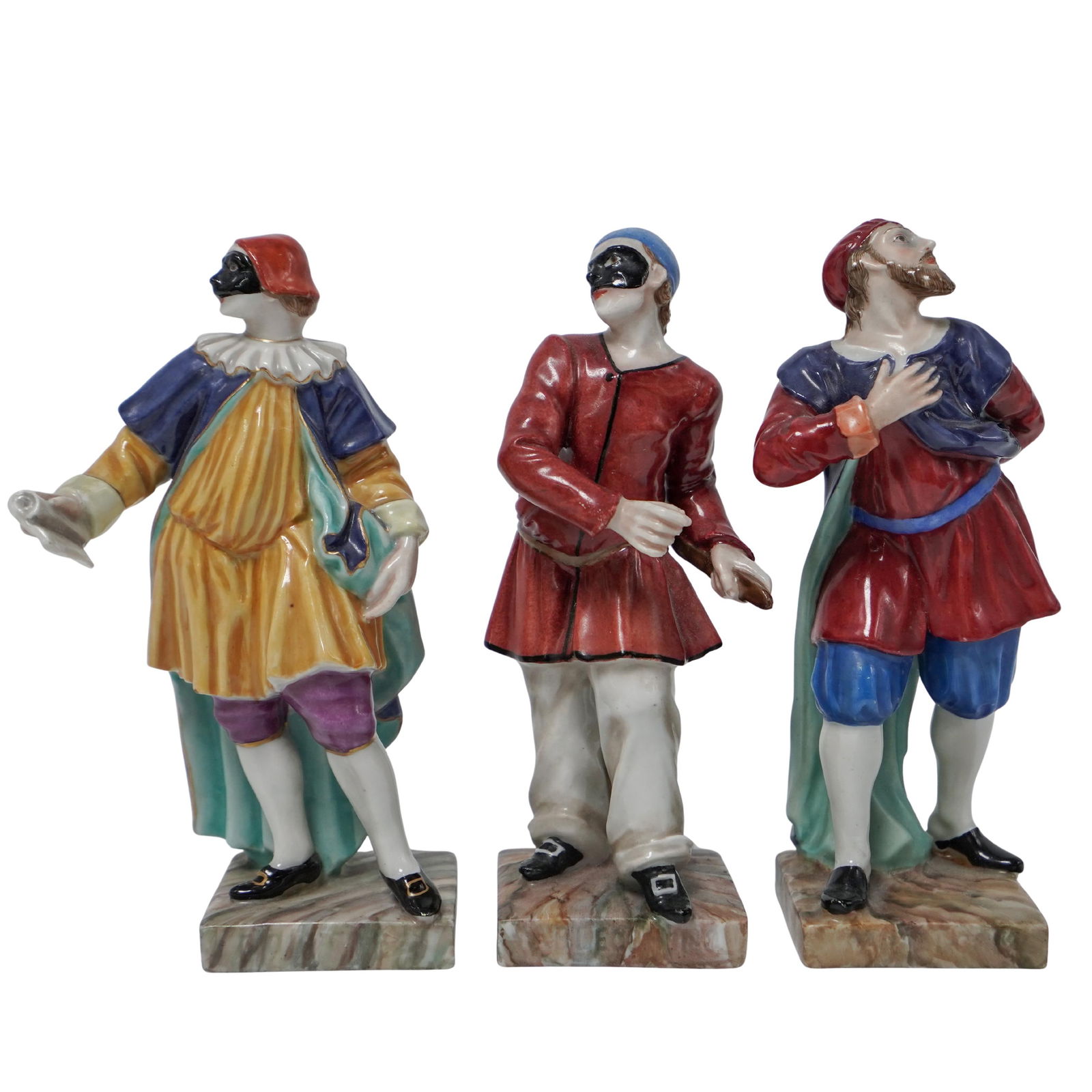 Capodimonte Porcelain Commedia dell’Arte Figures: Capodimonte Porcelain Commedia dell’Arte Figures20th Cent, Italyfinely modeled set of three Capodimonte porcelain figures representing characters from the Commedia dell’Arte, each dressed in color