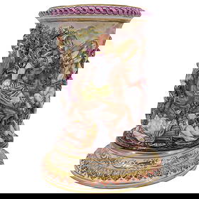 Capodimonte Deep Relief Porcelain Vase: Capodimonte Deep Relief Porcelain Vase20th Cent. Italy.Impressive Capodimonte porcelain vase.Hand-painted and modeled in high relief, depicting a dramatic classical battle scene with warriors, horses,