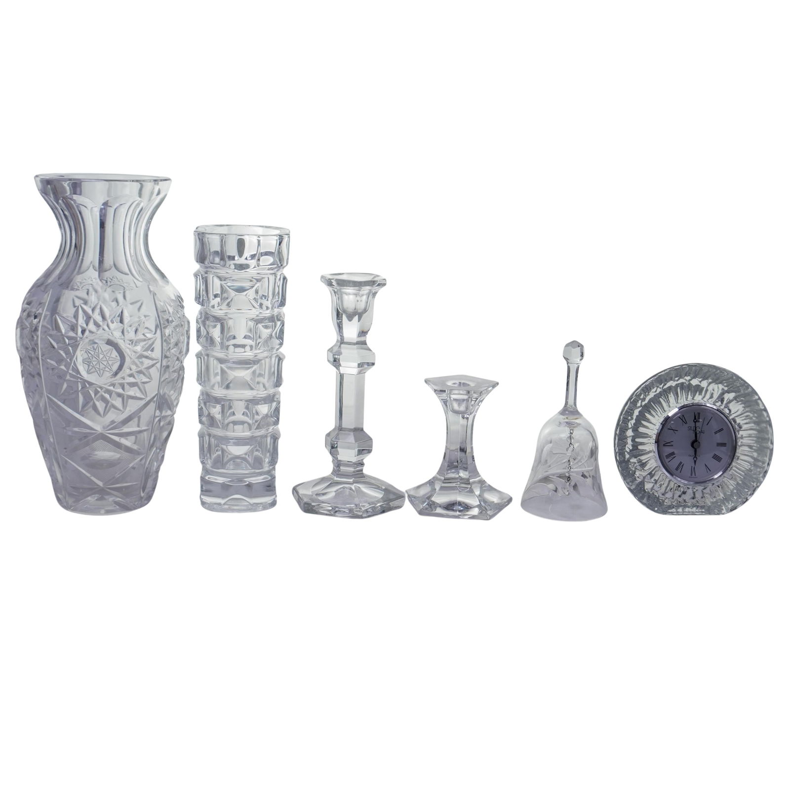 (6 Pc) Lot of Crystal Household Decor: (6 Pc) Lot of Crystal Household Decor20th c., ContinentalCristal D' Arques French cylindrical vase with a square pattern, large vase with a starburst pattern, two candle holders, one bell with an etch