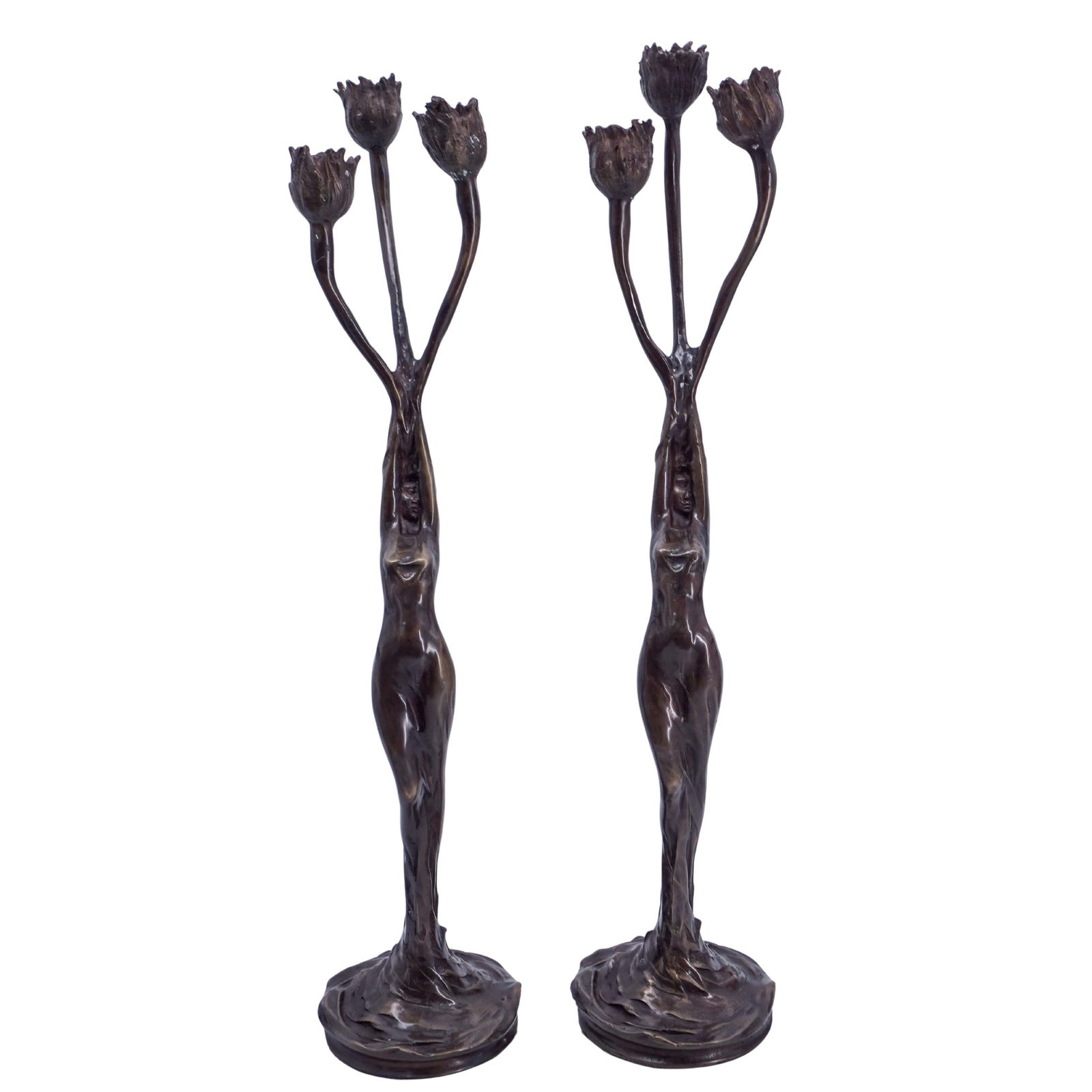 Pair of Firmin Bate Art Nouveau Bronze Candelabras: Pair of Firmin Bate Art Nouveau Bronze Candelabrasc. 1900, FranceAntique cast bronze three-arm candelabras featuring an elongated nude woman with raised arms holding the stems of three flower buds, wh