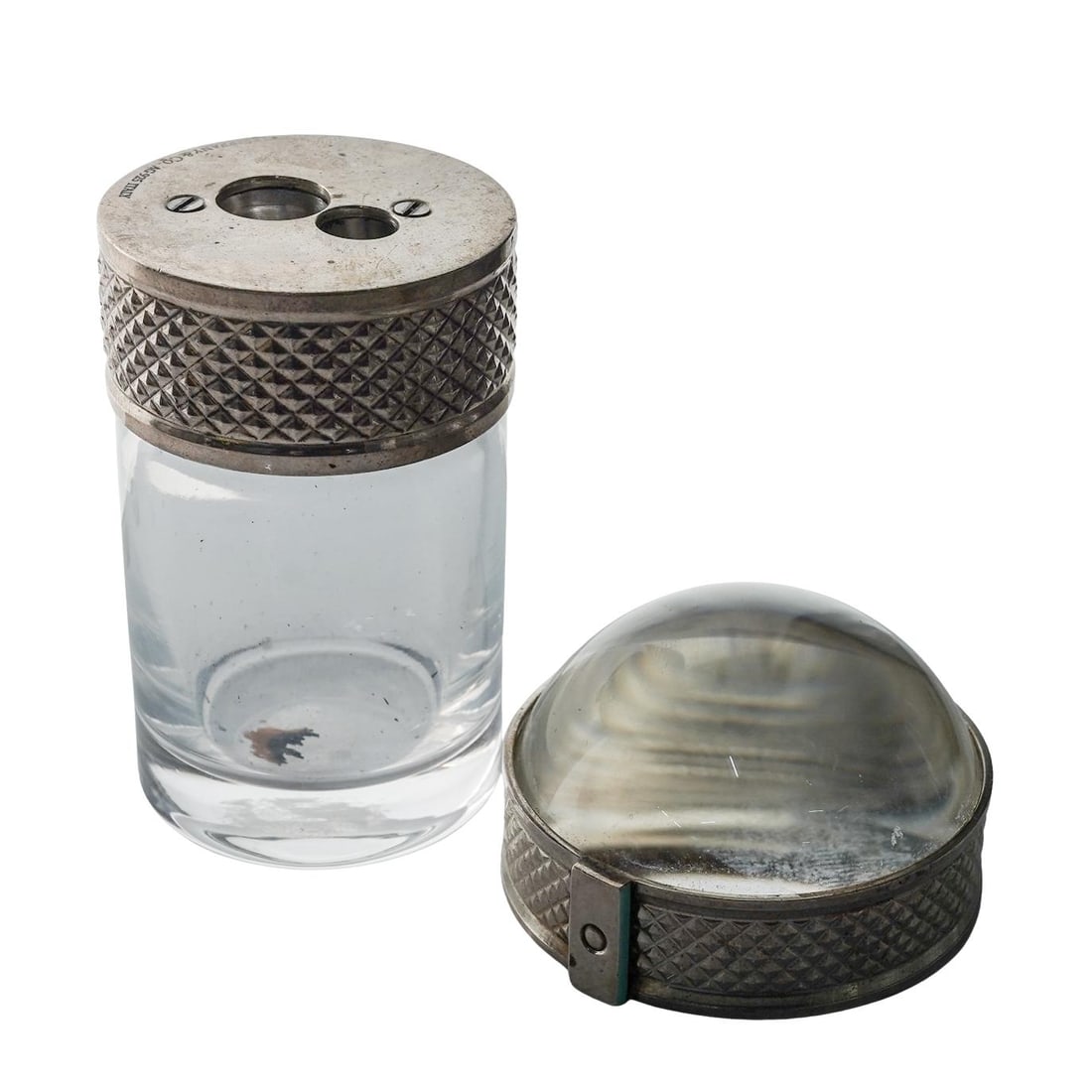 (2pc) Tiffany & Co. Sterling Silver and Crystal Desk Accessories: (2pc) Tiffany & Co. Sterling Silver and Crystal Desk AccessoriesMid 20th Cent.ItalyRefined pair of desk accessories comprising a reading magnifier and a pencil sharpener.Each piece combines clear crys