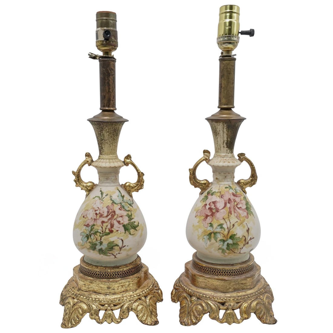 Pair of Vintage Bisque Porcelain Converted Lamps: Pair of Vintage Bisque Porcelain Converted LampsMid 20th Cent. Continental.Refined pair of Victorian style bisque porcelain lamps, each featuring a hand-painted floral bouquets in soft Patel tones.The