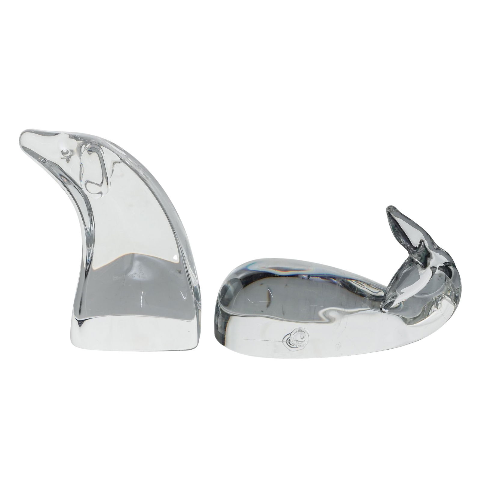 (2pc) Steuben Crystal Animal Figures: (2pc) Steuben Crystal Animal FiguresEarly to mid Cent.USATwo clear crystal animal figurines. One is a gracefully leaping seal with its body arched, and the other is a whale with a rounded body and its