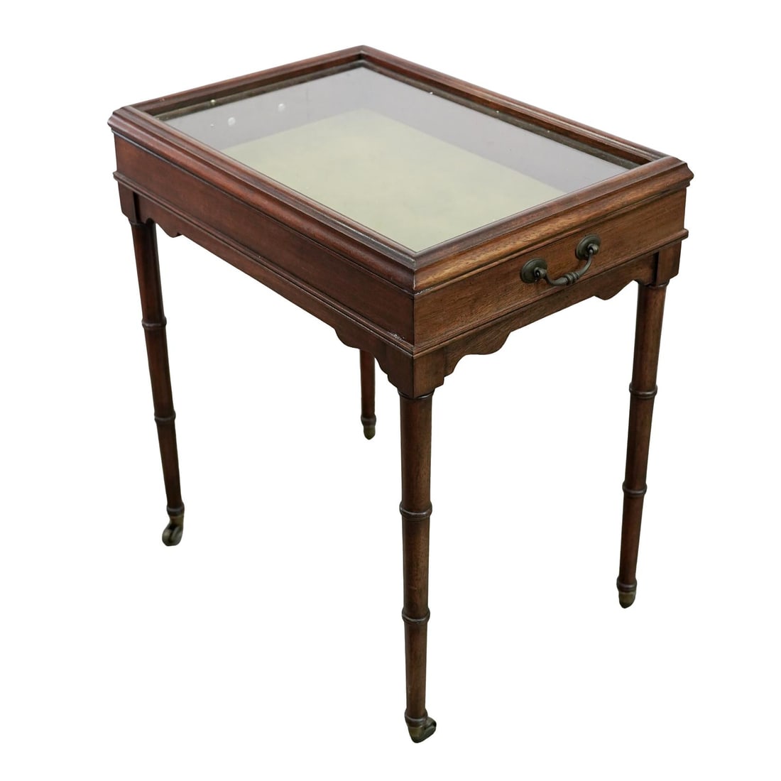 Edwardian Mahogany Bijouterie Display Table: Edwardian Mahogany Bijouterie Display Table 1901-1910, England An Edwardian bijouterie display table constructed from mahogany with a beveled glass top and green felt lining. Features a distinctively