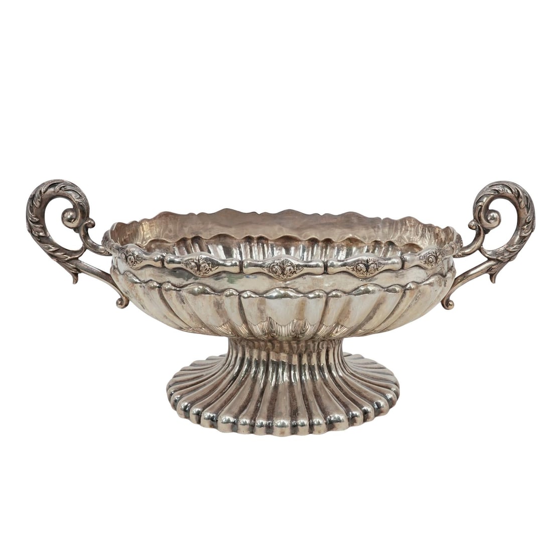 Antique Austrian 800 Silver Floral Centerpiece Dish: Antique Austrian 800 Silver Floral Centerpiece DishLate 19th-Early 20th c., AustriaSilver ribbed pedestaled dish with a floral rim and scrollwork handles. It has an "HI" maker's hallmark, and the Dian