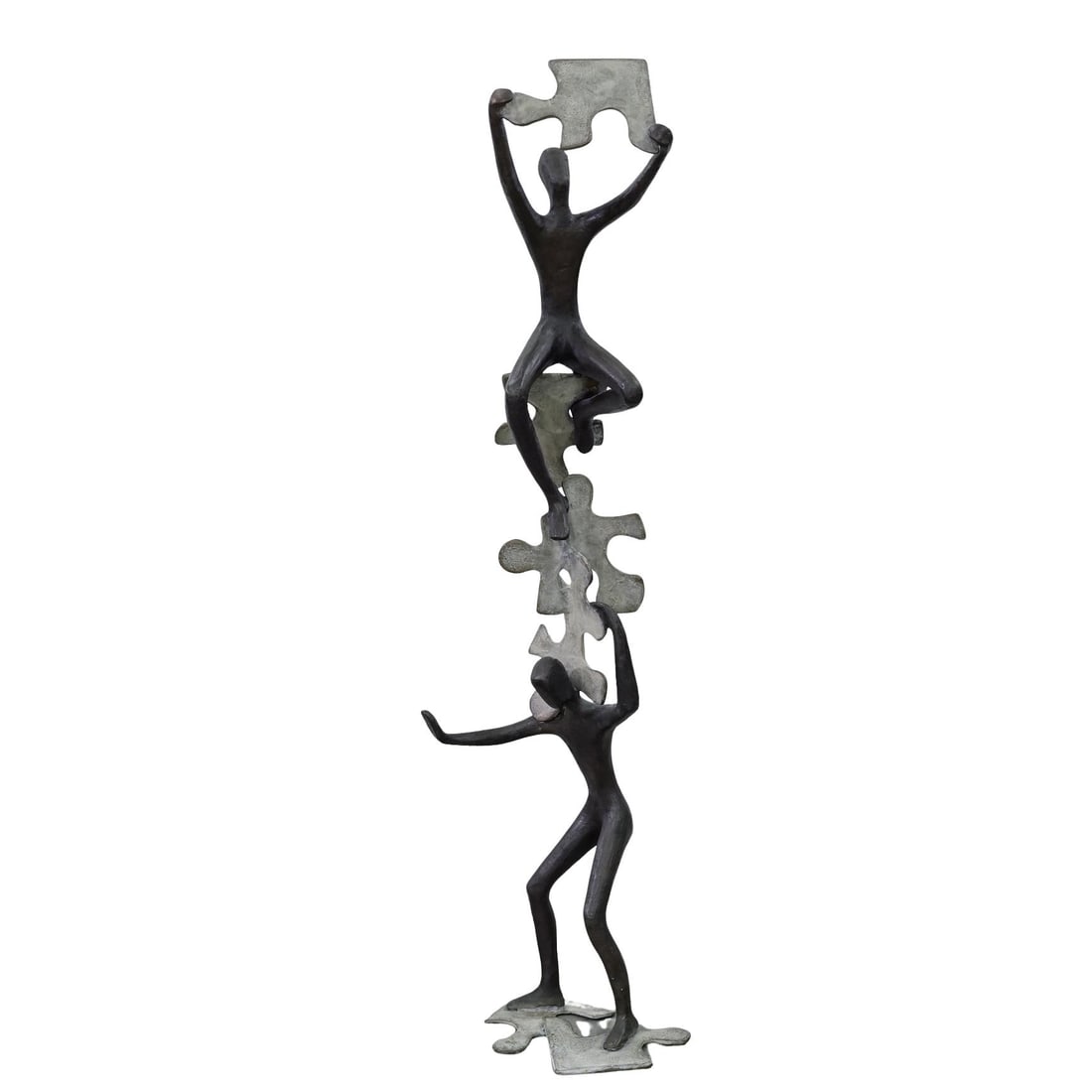 Bronze Abstract Puzzle Sculpture: Bronze Abstract Puzzle Sculpture20th centuryA bronze abstract sculpture of figures climbing with sculpted puzzle pieces.H 33.25" L 8" (length measurement is taken from the lowest figure, hand to oppos