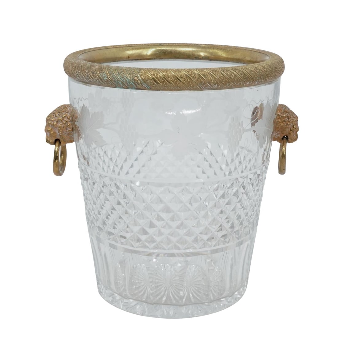 Baccarat Gilt Bronze Tete De Lion Mounted Crystal Ice Bucket: Baccarat Gilt Bronze Tete De Lion Mounted Crystal Ice Bucket20th century, FrenchLarge Baccarat Gilt-Bronze with Lion Heads mounted Crystal Ice BucketIt features exquisite cut crystal body with a diamo