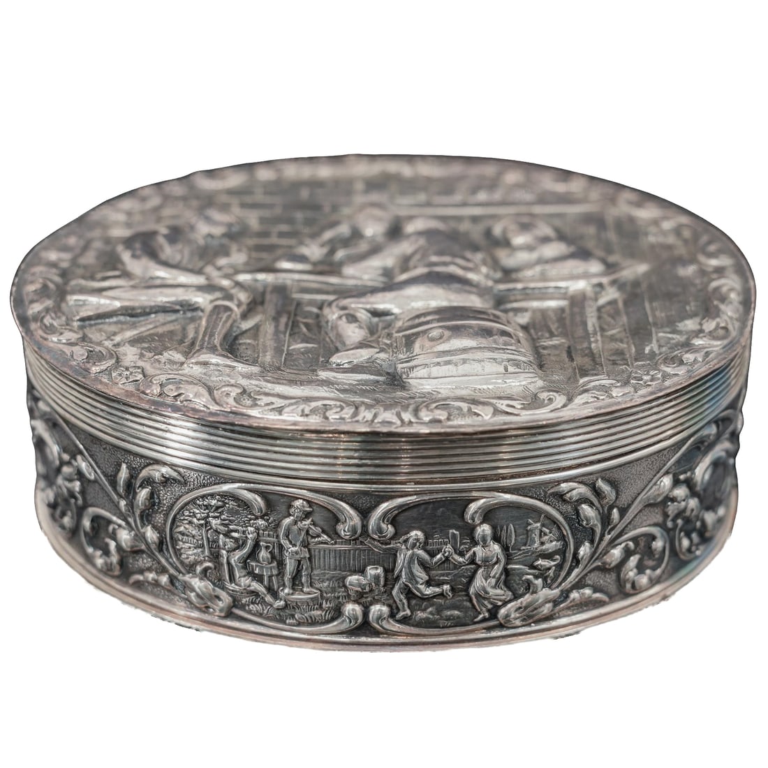 Holland "HH" Sterling Silver Trinket Box: Holland "HH" Sterling Silver Trinket Box19th Cent.,DutchAntique Dutch sterling silver oval trinket box, the lid finely repousse decorated with a genre tavern scene. Hinged lid and detailed side decora