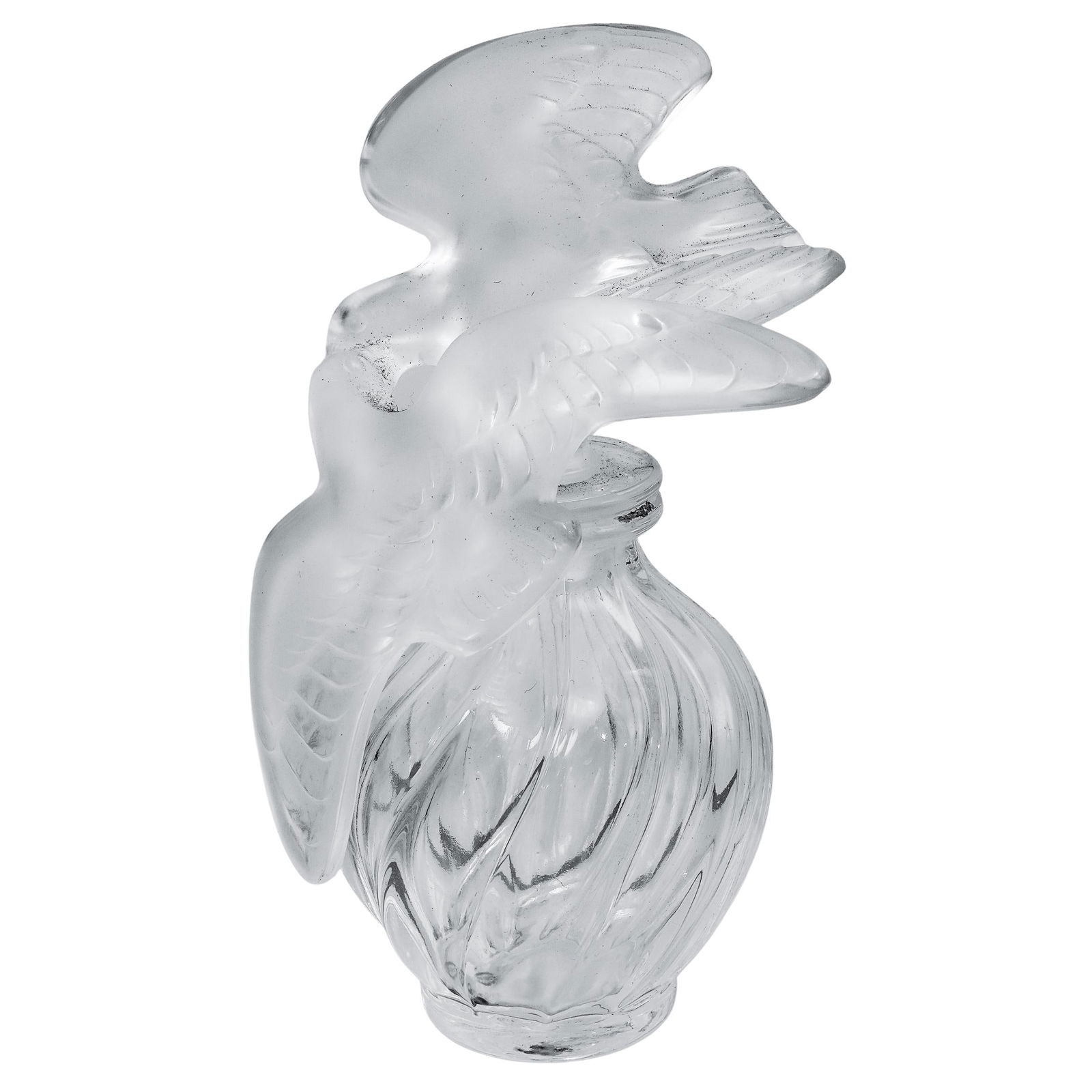 Lalique Nina Ricci LAir Du Temps Perfume Bottle: Lalique Nina Ricci LAir Du Temps Perfume Bottle20th Century, FranceA Lalique glass perfume bottle for Nina Ricci "L'Air du Temps" perfume with characteristic large stopper depicting a pair of kissing