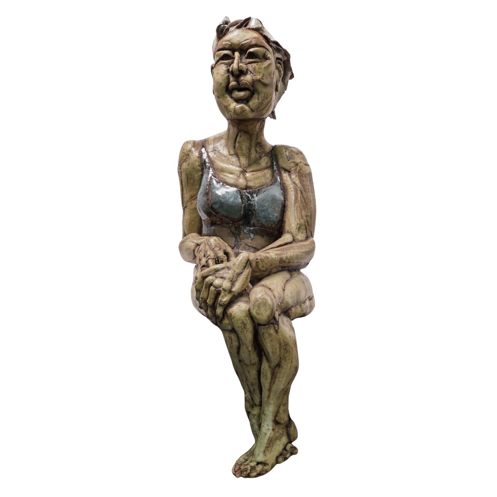 Lynda Pleet Kavaler Studio Art Ceramic Figure: Lynda Pleet Kavaler Studio Art Ceramic Figure 1977, American A studio art ceramic seated figure of a woman in a bathing suit by American artist Lynda Pleet (American, 20th century). Signed "Lynda